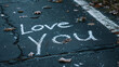 © HellSong - Love You Wallpaper - Chalk Typography on the wet asphalt