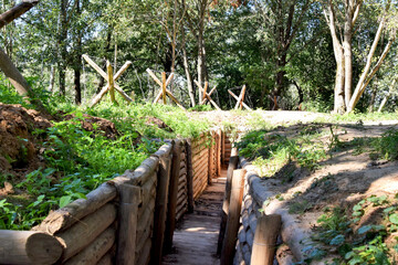 Fortification building. World War II trench at the edge of the forest