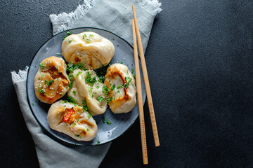 Sticker - Stuffed dumplings with vegetables on plate