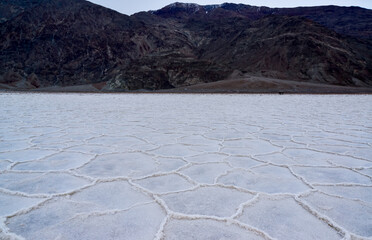 Death Valley National Park, Salt with clay, California. Smooth salt valley with cracked and swollen salt, dead salt landscape