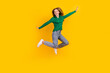 Full body length photo of carefree young girl flying wings arms wear trendy outfit clothes at party isolated on yellow color background