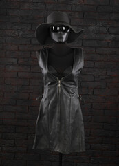 Sticker - black leather dress on a mannequin