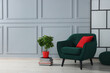 © New Africa - Stylish armchair with pillow and houseplant on floor near light grey wall indoors, space for text. Interior design