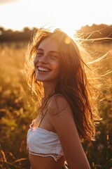 Canvas Print - A woman with long hair standing in a beautiful field. Ideal for nature and outdoor concepts