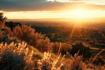 Sticker - A beautiful view of the sun setting over a picturesque valley. Perfect for nature lovers and landscape enthusiasts