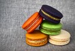 Five colorful macarons (macaroons) french dessert.