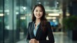 © Fly Frames - Portrait of a smiling asian businesswoman