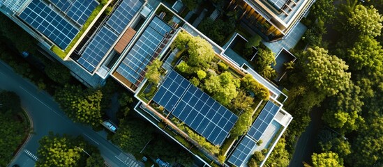 Eco building shopping center in aerial view Solar cell or photovoltaic cell in panel on top of roof to generate electrical power or direct current electricity Green clean energy for future