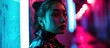 © HN Works - Futuristic portrait of asian teenager in neon light She is seriour daring cyberpunk fashionable girl. Creative Banner. Copyspace image