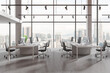 © ImageFlow - Office coworking interior with pc monitors in row, panoramic window