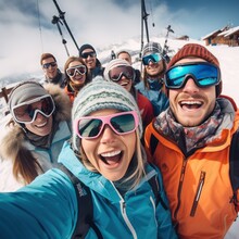 A Group Of Young And Senior People Taking Photo With Smart Phono, Selfie On The Snow Track Before Snowboarding