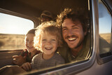 Fototapeta  - Portrait of a happy father with his sons traveling by car.