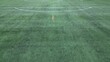 Drone aerial view of empty soccer football field without players during Covid-19 Coronavirus outbreak lockdown - sport activities 