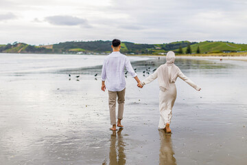 Poster - Afghani couple's wearing wedding outfit back view