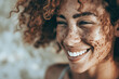 confident smiling woman with freckles