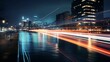 Night Symphony: Mesmerizing Cityscape with Illuminated Riverfront and Captivating Boat Trails