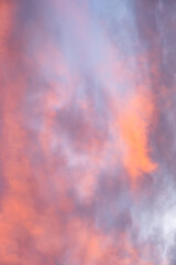 Wall Mural - Colorful sunset sky in purples, pinks, oranges, and blues, beautiful cloudscape background