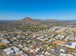 Scottsdale city center aerial view on Scottsdale Road at Main Street with Camelback Mountain at the background in city of Scottsdale, Arizona AZ, USA. 