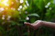 © panomporn - Technology,   Hands holding  globe of tropical nature summer background,