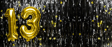 Gold Foil Balloon Number Number 13 On A Background Of Black Tinsel Decoration. Birthday Greeting Card, Inscription Thirteen. Anniversary Event. Banner.