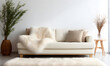 Leinwandbild Motiv Fur rug near ivory sofa with furry fluffy pillows against white wall with copy space. Scandinavian, hygge home interior design of modern living room.