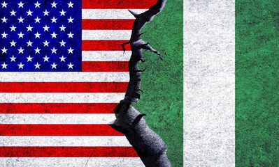 USA and Nigeria flags on a wall with a crack. Nigeria and United States of America political conflict, war crisis, economy, relationship, trade concept