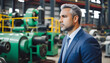 © Antonio Giordano - Thoughtful businessman looking away while standing against machinery in industry
