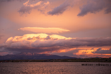 Wall Mural - sunrise with very dramatic sky in puerto natales, patagonia chile