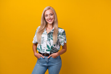 Wall Mural - Photo of satisfied adorable woman with straight hairdo dressed print shirt look at sale empty space isolated on yellow color background