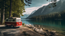 A Campervan Under The Trees And On The Edge Of A Calm Lake With Charming Mountain Views