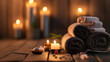 Spa brown background with towels, candles and copy space
