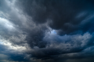 Wall Mural - storm sky, dark dramatic clouds during thunderstorm, rain and wind, extreme weather, abstract backgr