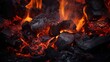 © petrrgoskov - Burning firewood and coals of a fire close up. Background for grilled food with fire.