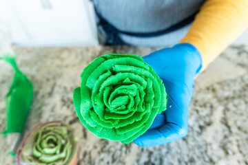 Wall Mural - Decorating Cupcakes with Cactus-Shaped Buttercream Frosting