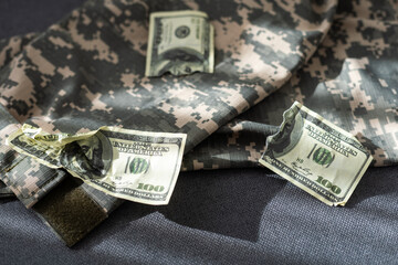 Wall Mural - American dollars banknotes on military pixel background.