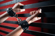 beautiful and sexy seductive woman in black leather handcuffs, foreplay and bdsm role sex games concept, bondage fetish