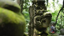 Hd Slow Motion Footage Of Balinese God Statue In Monkey Forest, Ubud, Bali, Indonesia.
Mid Angle, Parallax Movement.
