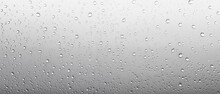 rain drops on window glass texture light grey realistic abstract background