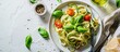 Pasta spaghetti with zucchini basil cream and cheese Top view with copy space on grey stone table Vegetarian vegetable pasta Zucchini noodles. Creative Banner. Copyspace image