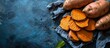 Sweet potato Cut sweet potato over blue table Sweet potato sliced ready to prepare baked pie with vegetables Top view. Creative Banner. Copyspace image