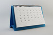 Paper desk calendar. Business meeting concept. 3D illustration