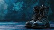 © Artyom - Worn combat boots on a textured blue surface