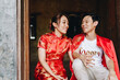 © topntp - Happy young Asian couple in Chinese traditional dresses