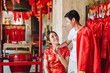 © topntp - Happy young Asian couple in Chinese traditional dresses