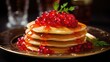 A stack of pancakes with red caviar on the table. A healthy breakfast. A delicious traditional dish on a dark background.