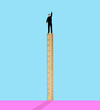 © Westend61 - Man standing on ruler against colored background