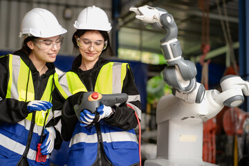 Poster - Mechanical engineering people training, programming automated AI robot arms connection at production factory. Smart female industrial engineer working at heavy futuristic robotic machinery workshop.
