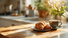 Coffee Cup And Fresh Baked Croissant On A Plate On A Wooden Table For French Breakfast In The Morning On A Balcony