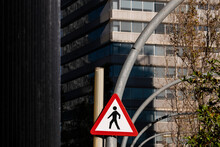 Yield To Pedestrians Traffic Sign In A Modern Financial Area