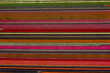 aerial overhead shot of colorful horizontally striped flowers field